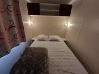 Posteľ alebo postele v izbe v ubytovaní Camping du Nizour