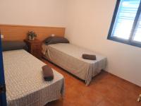 A bed or beds in a room at CAL GARRETA