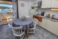 Kuchyň nebo kuchyňský kout v ubytování Apartments SIME