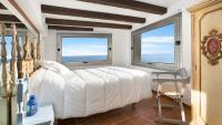 Postel nebo postele na pokoji v ubytování 2Cany - Casa de lujo en la Costa Brava