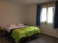 Łóżko lub łóżka w pokoju w obiekcie Villa La Barbière