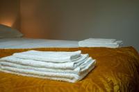 Łóżko lub łóżka w pokoju w obiekcie Le Triplex - 4 pers - Wifi - Centre ville