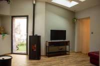 Telewizja i/lub zestaw kina domowego w obiekcie Le Triplex - 4 pers - Wifi - Centre ville