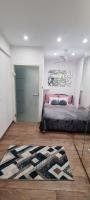 Postel nebo postele na pokoji v ubytování Apartman Julija 1