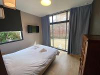Łóżko lub łóżka w pokoju w obiekcie Parc Beausejour Aparthotel