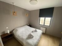 Łóżko lub łóżka w pokoju w obiekcie Parc Beausejour Aparthotel