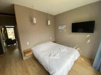Łóżko lub łóżka w pokoju w obiekcie Parc Beausejour Aparthotel