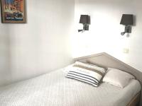 Łóżko lub łóżka w pokoju w obiekcie Appartement 2 Pièces avec Piscine et Parking - FR-1-504-663