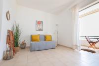 A seating area at Kallopsia - Glifada Beach Menigos Resort by New Era