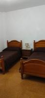 Postel nebo postele na pokoji v ubytování Casa Pili