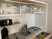Kuchnia lub aneks kuchenny w obiekcie Camping 5* - Biscarosse Lac - MobilHome 2 chambres - 4 personnes