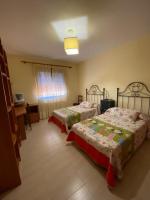 Postel nebo postele na pokoji v ubytování CASA RURAL ALHAMBRA RUIDERA
