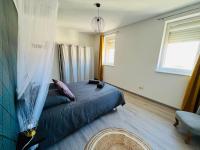 Posteľ alebo postele v izbe v ubytovaní Duplex 100m2, 3 Chambres, Centre