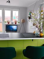 Televízia a/alebo spoločenská miestnosť v ubytovaní Apartament Długie Ogrody 2 pokojowy