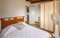 Posteľ alebo postele v izbe v ubytovaní 2 Bedroom Cozy Home In San Nicolao