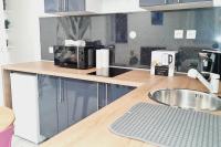 Kuchnia lub aneks kuchenny w obiekcie Appartement très lumineux et calme.