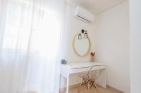 The floor plan of Kallopsia - Glifada Beach Menigos Resort by New Era