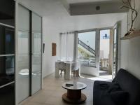 Część wypoczynkowa w obiekcie Appartement cosy avec jardin près du port et des plages à Capbreton - FR-1-239-905