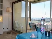 Posedenie v ubytovaní Studio climatisé, piscine & parking, proche plage - FR-1-252A-99