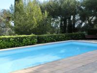 Bazén v ubytovaní Studio climatisé, piscine & parking, proche plage - FR-1-252A-99 alebo v jeho blízkosti