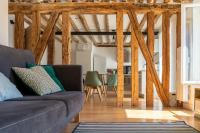 Część wypoczynkowa w obiekcie Appartement proche DisneyLand et Paris