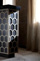 a black and white table in a room with a curtain at Alle Guglie Boutique Hotel in Venice