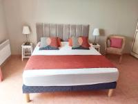 Un pat sau paturi &icirc;ntr-o camer&#x103; la Villa Romuald
