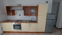 A kitchen or kitchenette at Appartamento Alessandro