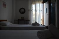 Posteľ alebo postele v izbe v ubytovaní Poseidon Studios Chania Center