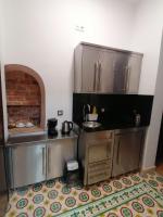 A kitchen or kitchenette at Casa 1899