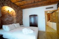 A bed or beds in a room at Casa 1899