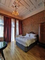 A bed or beds in a room at Casa 1899
