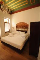 A bed or beds in a room at Casa 1899