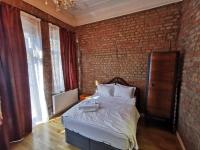 A bed or beds in a room at Casa 1899