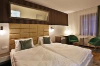 Posteľ alebo postele v izbe v ubytovaní VIP Apartments