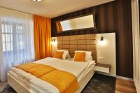 Posteľ alebo postele v izbe v ubytovaní VIP Apartments