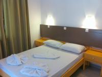 Postel nebo postele na pokoji v ubytování Fantasia Hotel Apartments