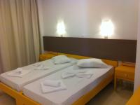 Postel nebo postele na pokoji v ubytování Fantasia Hotel Apartments