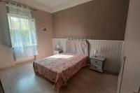 Łóżko lub łóżka w pokoju w obiekcie maison 4 à 6 personnes proche village