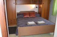 Posteľ alebo postele v izbe v ubytovaní Apartments & Rooms Tea