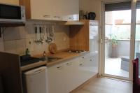 Kuchyňa alebo kuchynka v ubytovaní Apartments & Rooms Tea