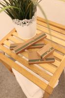 a wooden table with a potted plant on it at Pension Alte Scheune in Melsungen