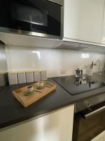A kitchen or kitchenette at Ultra stylish modern attic