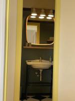 A bathroom at Ultra stylish modern attic