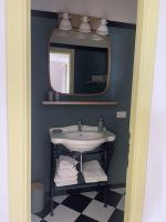 A bathroom at Ultra stylish modern attic
