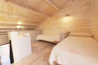 Posteľ alebo postele v izbe v ubytovaní Vall d'Àger Resort & Camping