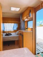 A bed or beds in a room at Glamping Caravan Lanzarote