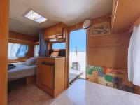 A bed or beds in a room at Glamping Caravan Lanzarote