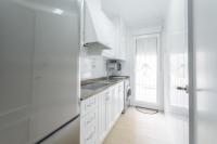 A kitchen or kitchenette at Egeu