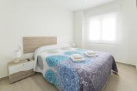A bed or beds in a room at Egeu